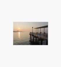 #sunset #water #sea #pier #beach #dusk #reflection #sky #lake #outdoors #landscape #horizontal #yellow #colorimage #sunrisedawn #nopeople #sun #sunny #watersedge #coastline #nonurbanscene Art Board