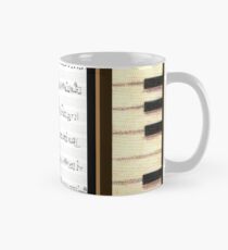 Piano keys with sheet music by Kristie Hubler Mug