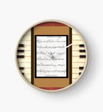 Piano keys with sheet music by Kristie Hubler Clock