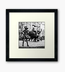 Fearless Girl statue facing Charging Bull in New York City | Black and White Framed Print