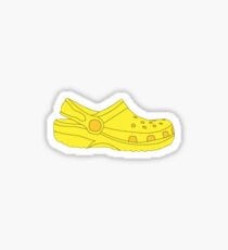 yellow crocs with stickers