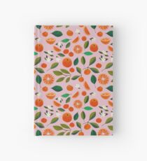Cuaderno de tapa dura naranjada