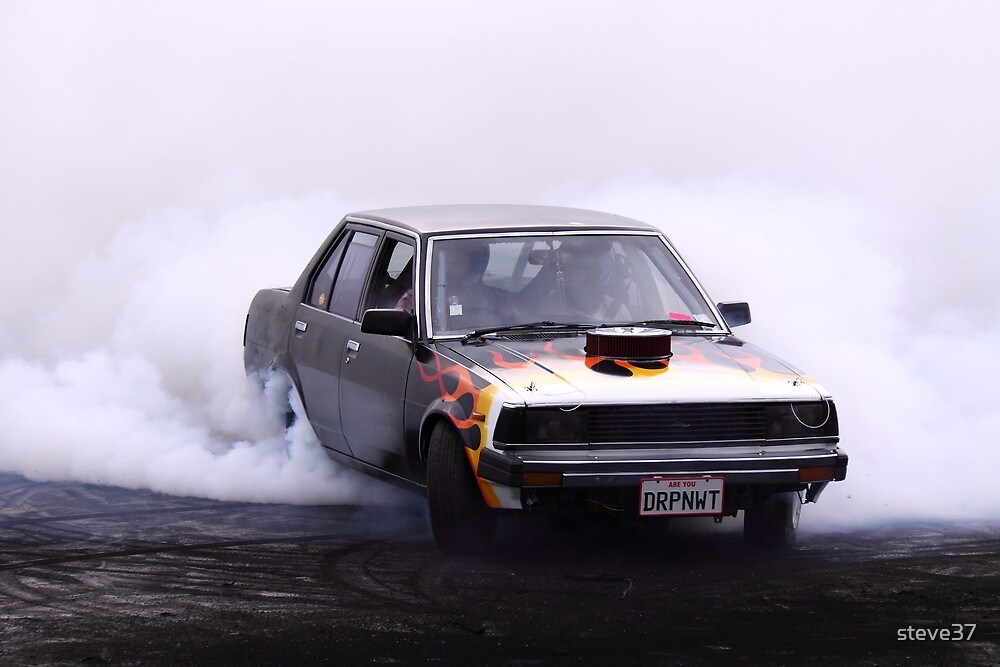 "Japanese car powered by a V8 doing a burnout" by steve37 Redbubble