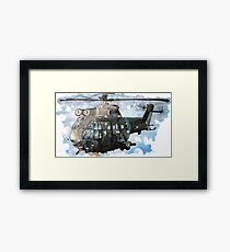 Helicopter Gunship with background Framed Print