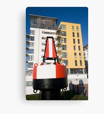 Buoy and Flats at Eastbourne Marina Canvas Print