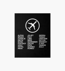 Lámina rígida El alfabeto fonético con una imagen de un avión.