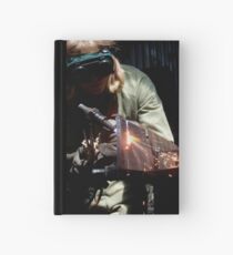 Ben welding by Charlie Hardcover Journal