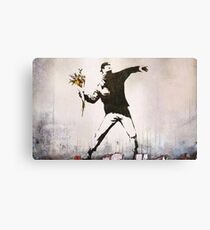 Banksy 'flower thrower' graffiti art. Canvas Print