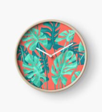 Monstera verlässt lebende Korallen. Uhr