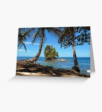 Coconut trees and a lush tropical islet Greeting Card