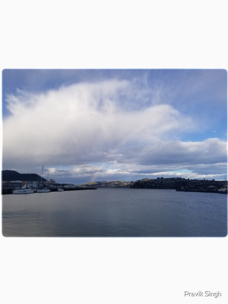 Sudden Rainbow Over the Cloudy Docks by pravik