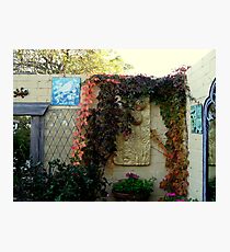 Plaques and baskets in a cottage garden Photographic Print