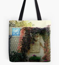 Plaques and baskets in a cottage garden Tote Bag