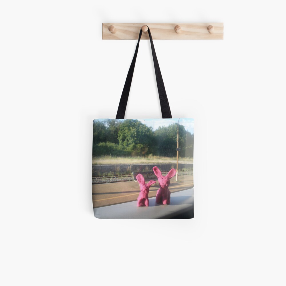 Rabbits on a train Tote Bag