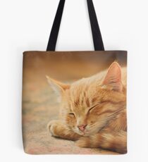 Little Red Kitten Sleeping On Bed Tote Bag