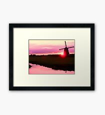 SUN AND WIND Framed Print