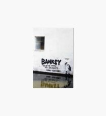 Banksy vs. TEAM ROBB☮ Art Board Print