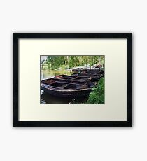 Boats on a lake Framed Print