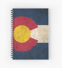 Alte und abgenutzte beunruhigte Weinlese-Flagge von Colorado Spiralblock