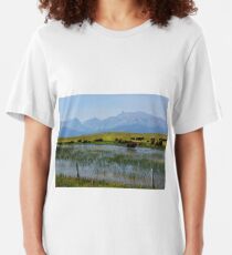 Bison Herd by a Lake Beneath Hazy Mountains Slim Fit T-Shirt