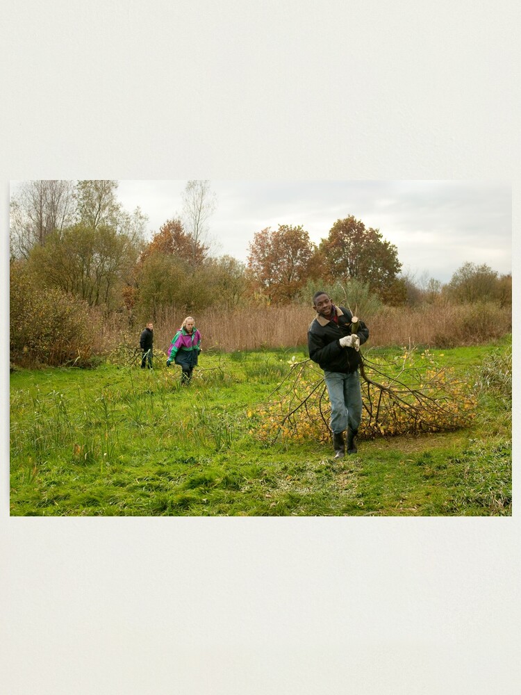 Alternate view of Young volunteers at work in nature Photographic Print