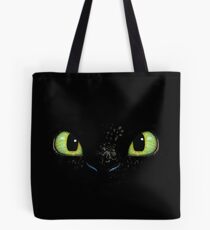 Toothless fiery eyes Tote Bag