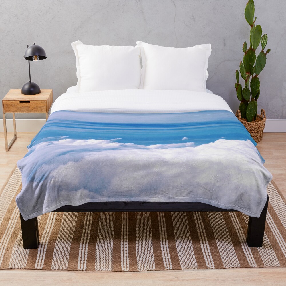 In The Clouds on a throw blanket