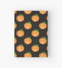 Halloween Pumpkins on Black Background Hardcover Journal