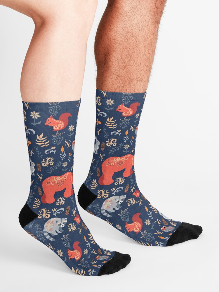 Alternate view of Fairy-tale forest. Fox, bear, raccoon, owls, rabbits, flowers and herbs on a blue background. Socks