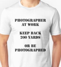 Photographer at work Unisex T-Shirt