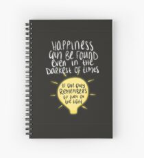 Happiness can be found even in the darkest of times, if one only remembers to turn on the light. Spiral Notebook