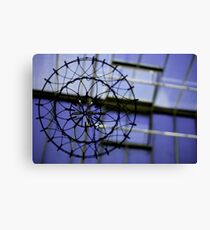 A hanging basket in the orangery Canvas Print