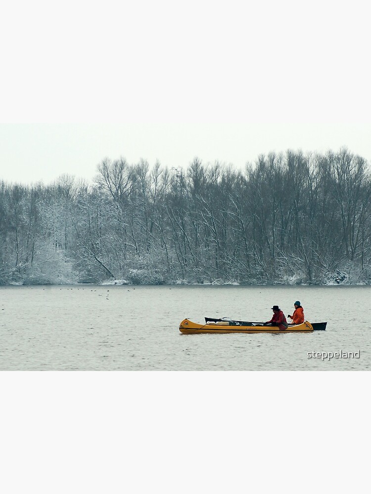 Two canoes on a winter lake by steppeland