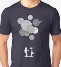 Between planets and balloons. Unisex T-Shirt