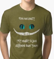 I'm not crazy. My reality is just different than yours Tri-blend T-Shirt