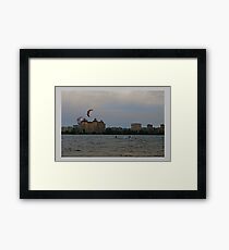 The hunter behind clouds Framed Print