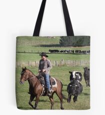 horseman being chased by cattle! Tote Bag