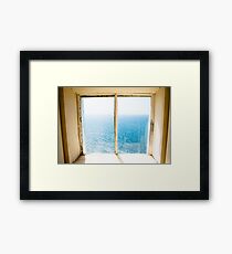 window to the sea Framed Print